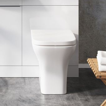 Amara Skipton Back to Wall Toilet With Wrap Over Seat in White